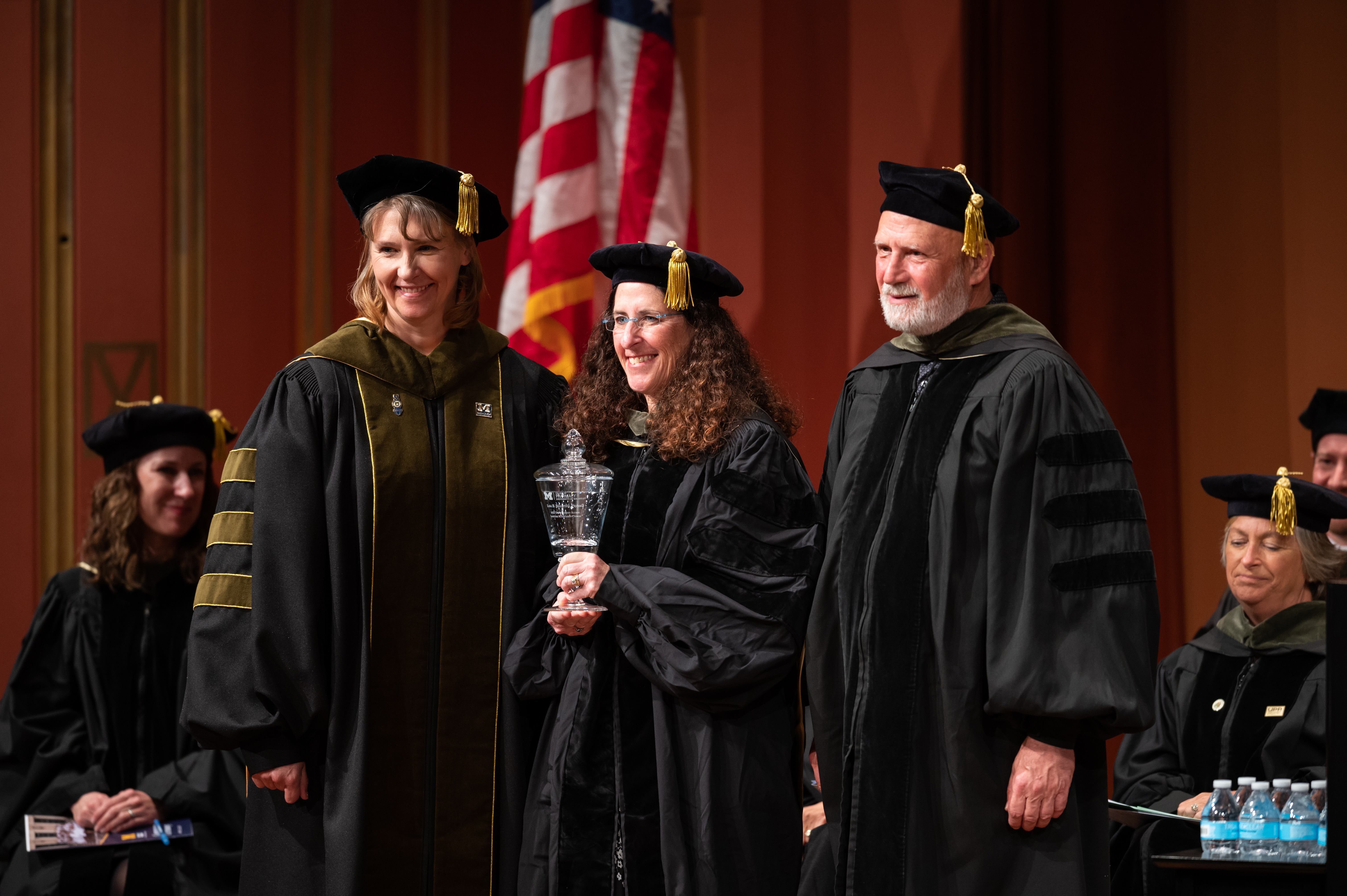 Dr. Ilisa Bernstein accepts her award at the 2023 University of Michigan College of Pharmacy PharmD Commencement.