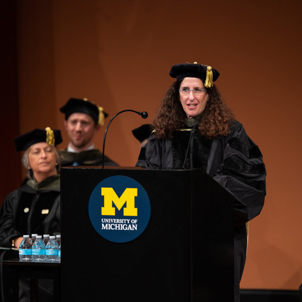 Dr. Ilisa Bernstein accepts her award at the 2023 University of Michigan College of Pharmacy PharmD Commencement.