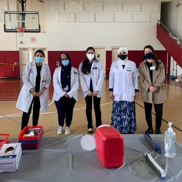 Faculty and student volunteers at the COVID vaccination clinic 