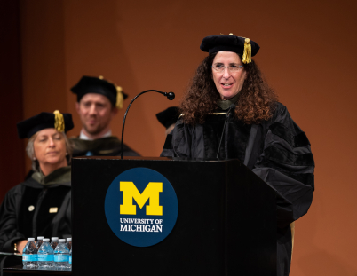 Dr. Ilisa Bernstein accepts her award at the 2023 University of Michigan College of Pharmacy PharmD Commencement.