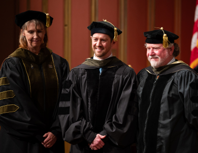 Austin and Grant Brown accept their award during the 2023 Michigan PharmD Commencement Ceremony.