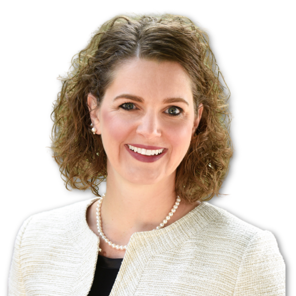 Nicole Rockey, a preceptor award winner, poses for a photo in front of a white backdrop.