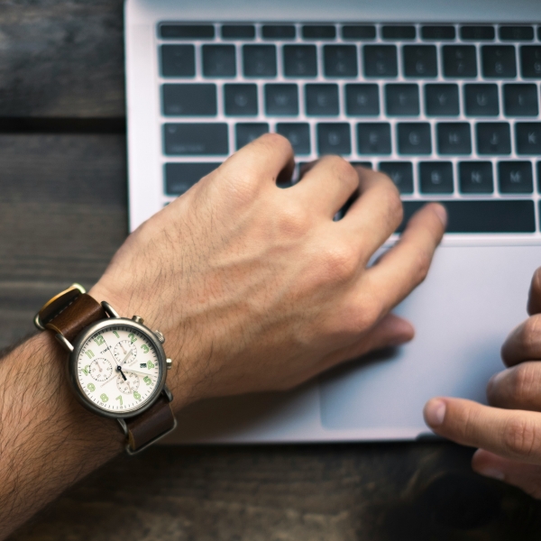 Typing on a laptop computer